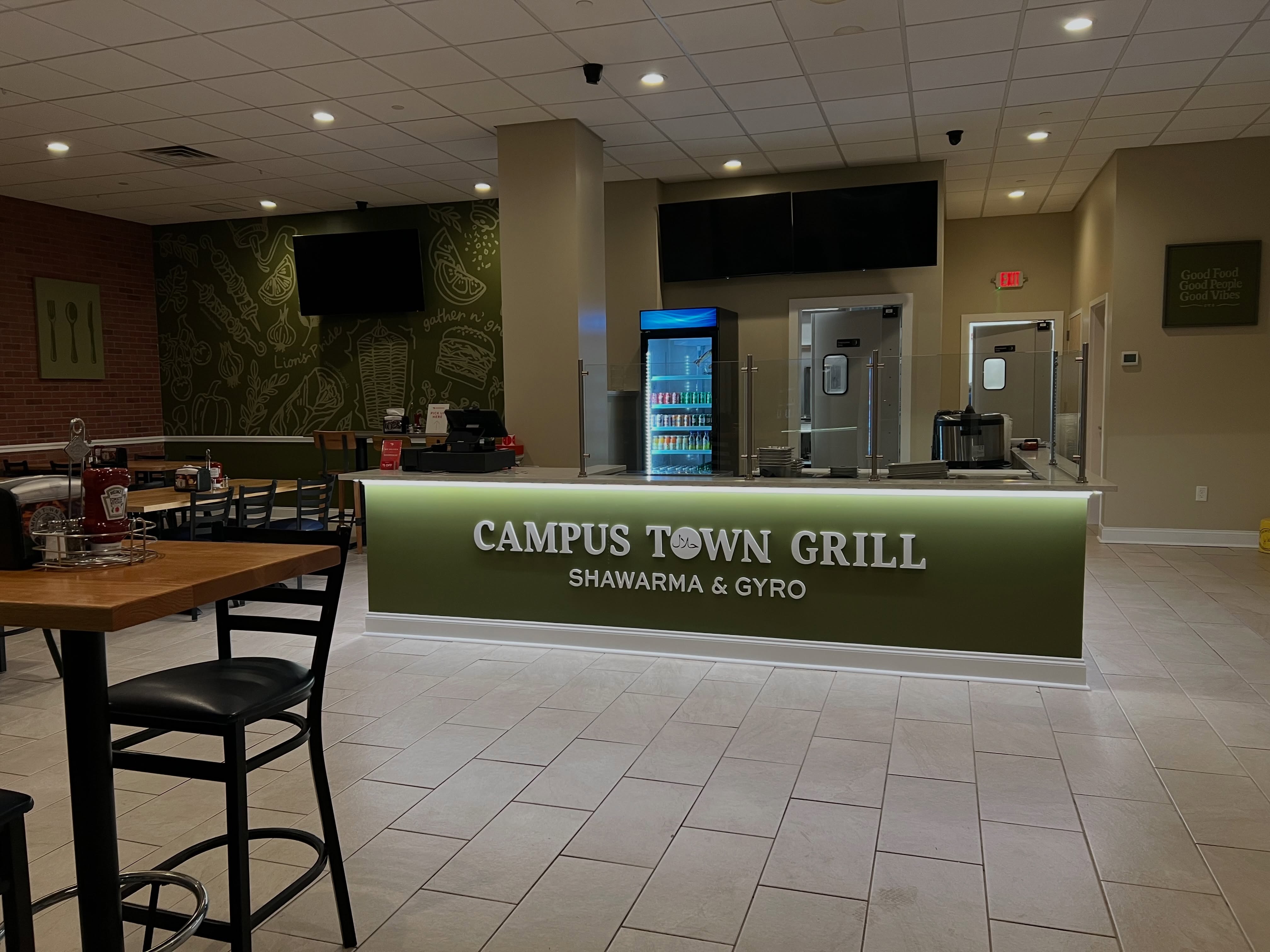 Campus Town Grill dining room with its olive-green counter